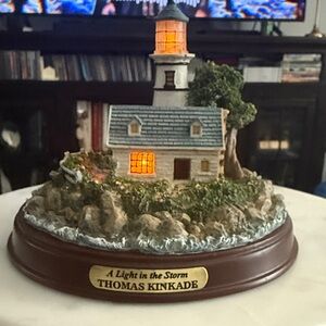 Thomas Kinkade Illuminated Lighthouse “A Light in the Storm” collection.
